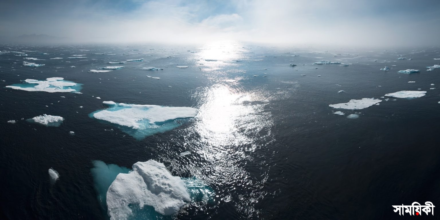 landscape and aerial photography of icebergs on body of water during daytime